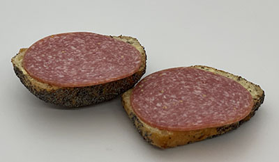 Tillæg: Spegepølse på rundstykke